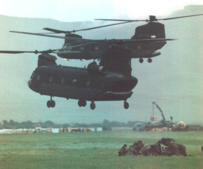 Boeing CH-47D Chinook delivering the troops.