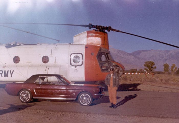 A1C Lowell Maybrier and his 1964 Mustang somewhere in California.