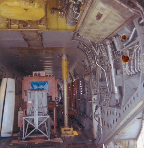 A rare photograph showing the interior of the CH-47A with the Maintenance Crane installed. The maintenance crane (the yellow item, mounted vertically on the right side)  suppossedly provided the crew with the capability to change an engine without an additional ground support vehicle, such as a crane.