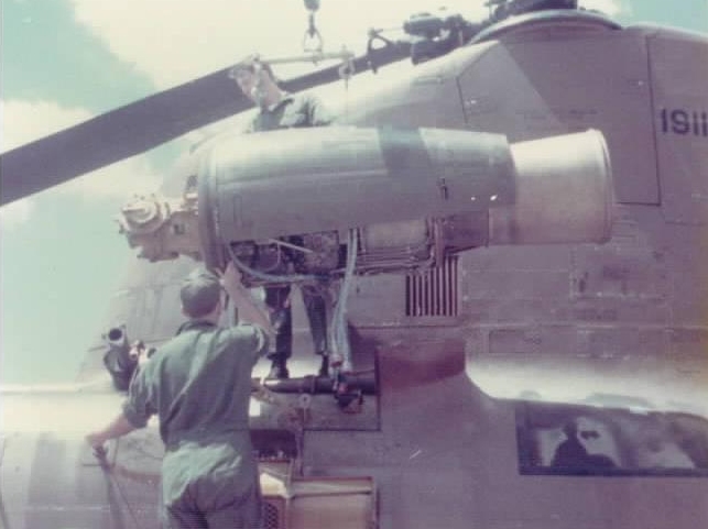 Changing the Number 1 Engine on CH-47B Chinook helicopter 66-19119 at Fort Campbell, Kentucky, 1976.