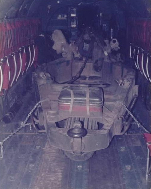 Loading a Howitzer inside CH-47B Chinook helicopter 66-19119 at Fort Campbell, Kentucky, 1978.