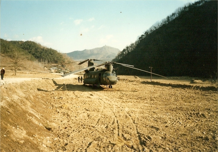 CH-47C Chinook helicopter 67-18532 in a field site in the Republic of Korea (South Korea) after a wire strike incident that occured on 9 December 1985.
