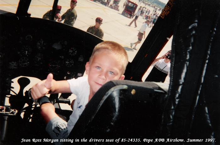Mr. Jean Ross Morgan, Age 5, sitting in the drivers seat of Chinook Helicopter 85-24335, Pope AFB Airshow, Summer 1997.