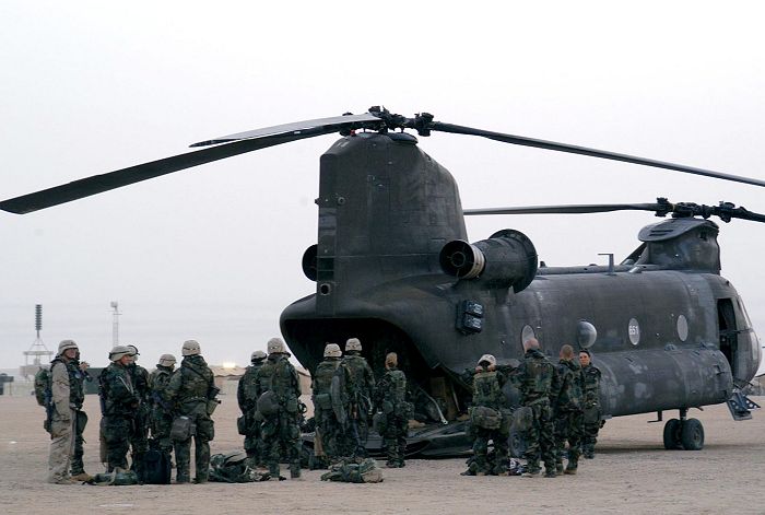 1 April  2003,  Camp New Jersey, Kuwait: Soldiers with the 101st Airborne Division begin boarding CH-47D Chinook helicopter 86-01651 on Tuesday that took them into Iraq for their first time. At this point, the 101st Airborne was operating almost entirely from Iraq and was conducting deep air assaults from it's forward operating bases.