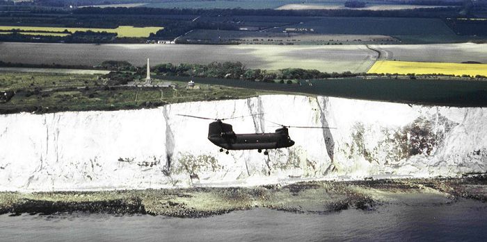 May 1995: Boeing CH-47D Chinook helicopter 88-00082 passes by the white cliffs of Dover, England.