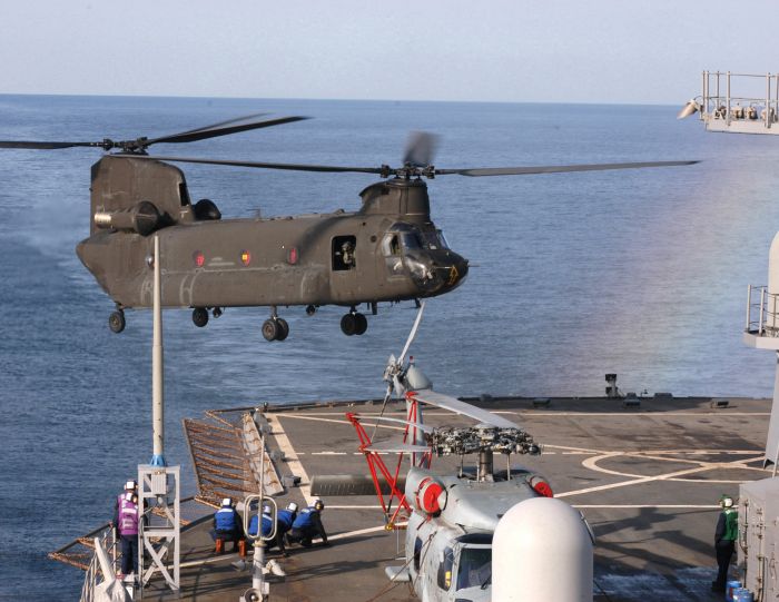 CH-47D Chinook helicopter 88-00089, from the 52nd Aviation Regiment, Camp Humphreys, South Korea, lands aboard the Seventh Fleet command ship USS Blue Ridge, during an Army-Navy training exercise off the coast of Korea.