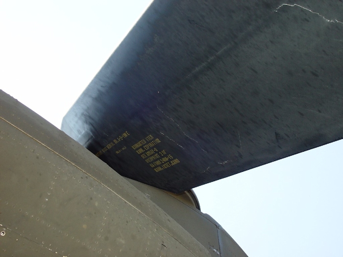 July 2002: This photograph shows extensive damage to an aft rotor blade. There are cracks and tears in the structure of the blade.