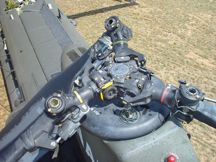 July 2002: Without the droop stops engaged and the dampner firmly attached, an aft rotor blade will make contact with the fuselage during engine shutdown and cause extensive damage.