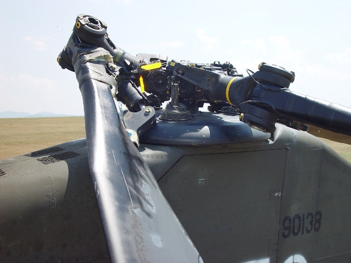 July 2002: Without the droop stops engaged and the dampner firmly attached, an aft rotor blade will make contact with the fuselage during engine shutdown and cause extensive damage. It will also eventually make contact with the ground.