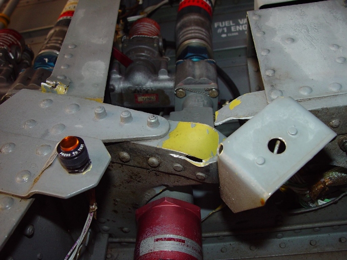 July 2002: Another view of the damage done to the bulkhead and fuel fitting.