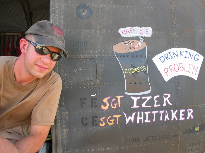 SGT Jeremy Whittaker and the nose art of 89-00139, circa October 2003.