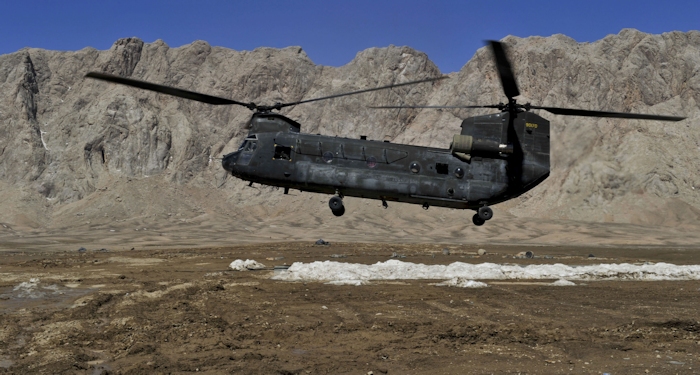 In an undated photograph, U.S. Army  CH-47D Chinook helicopter 89-00170 comes in to land at a remote landing zone in Afghanistan in order to resupply U.S. Special Operations forces. Chinooks were used extenisvely in Afghanistan due to their ability to carry large numbers of troops and supplies to all parts of the country, including the mountanous regions.