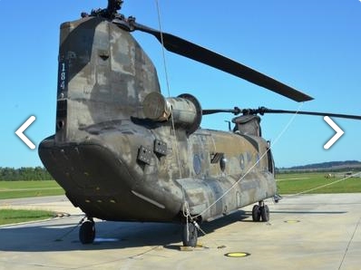 Right rear view of CH-47D Chinook helicopter 90-00184 sitting at Madison Executive Airport (KMDQ), Meridianville, Alabama, during the auction process as it went up for sale to the highest bidder on the commercial market.