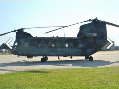 Left side view of CH-47D Chinook helicopter 90-00184 sitting at Madison Executive Airport (KMDQ), Meridianville, Alabama, during the auction process as it went up for sale to the highest bidder on the commercial market.