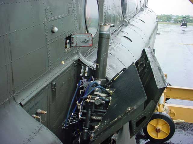 Boeing CH-47D Chinook 91-00233 at the accident site showing the damage caused by the swashplate failure.