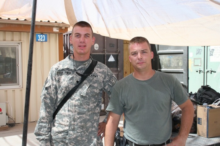 August 2009: SPC Brian Paradowski (left), Crew Chief, and SGT Miaicon Myers, Flight Engineer, on 06-08720 while deployed to Afghanistan.