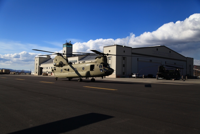 19 April 2012: CH-47F Chinook helicopter 08-08773 taxies past historic Hangar 1 upon its arrival at Ladd field, Fort Wainwright, Alaska.