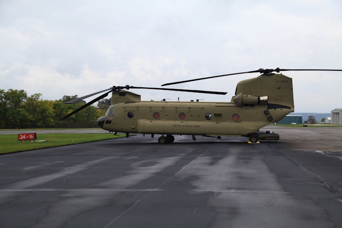 26 September 2012: CH-47F Chinook helicopter 10-08803 rests on the ramp at Wheeling Ohio County Airport (KHLG), West Virginia, during a fuel stop on the aircraft delivery ferry flight to Marshall Airfield (KFRI), Fort Riley, Kansas.