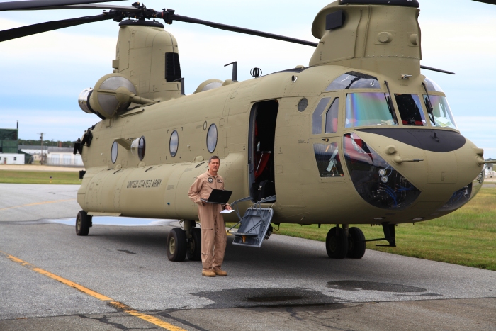 19 September 2012: Andy Mankie reviews the logbook of CH-47F Chinook helicopter 10-08804 as the crew readies the aircraft for the delivery ferry flight from Millville Municipal Airport (KMIV) to Marshall Airfield (KFRI), Fort Riley, Kansas.