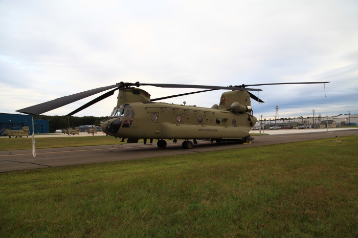 19 September 2012: CH-47F Chinook helicopter 10-08806 sits on the ramp at Millville Municipal Airport (KMIV) ready for the aircraft delivery flight to Marshall Airfield (KFRI), Fort Riley, Kansas. In the distance to the rear of the aircraft is Vera's Flight Line Restaurant. The S3 Incorporated New Equipment Training Team (NETT) enjoyed many a fine lunch at this establishment.