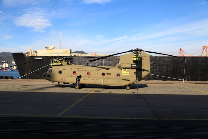 8 November 2013: CH-47F Chinook helicopter 11-08841 sits on the dock at Pier 8, Busan, Republic of Korea, awaiting preflight inspection by members of the CH-47F New Equipment Training Team.