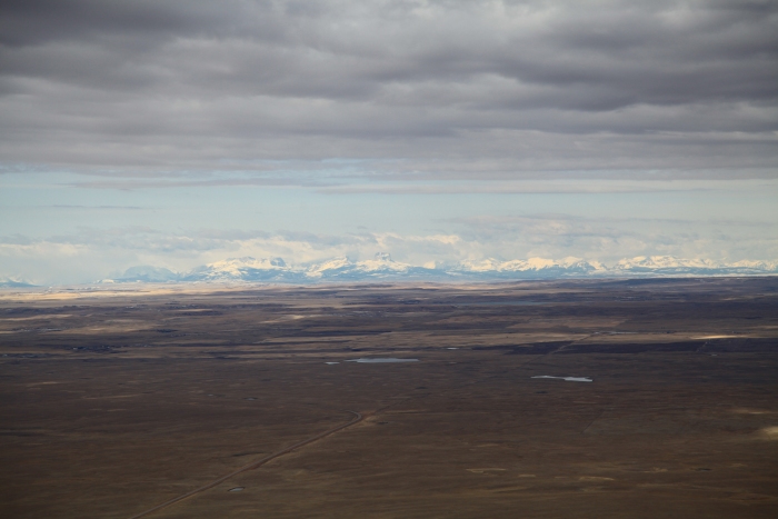 16 April 2012: Having just crossed the border into Canada, the view from Sortie 1 revealed the Northern Rocky Mountains about 30 miles to the west of the route.