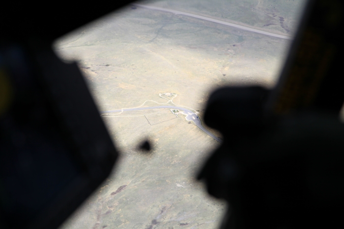 12 April 2012: On Sortie 1's way to Billings, Montana, for refuel, it passed over Little Bighorn Battlefield National Monument. Shot through the right chin bubble window of 08-08771, this was the only photograph the flight captured.