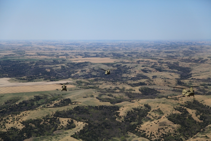11 April 2012: As the flight approached South Dakota, some rolling hills were encountered rather than the flat, featureless terrain, found west of KSUX. The Desert Suede paint scheme of the F models seemed to fit in OK in this environment.