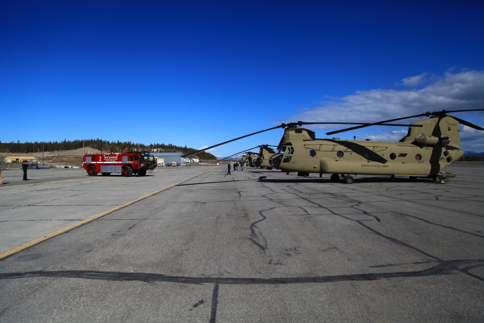 18 April 2012: While the Sortie 1 aircraft receive fuel the Whitehorse Airport Fire Department personnel come out to pay a visit to the new Chinook helicopters.