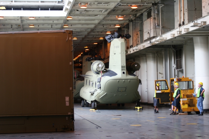18 November 2010: CH-47F Chinook helicopter 07-08743 and 13 other Chinook helicopters sit on B deck amidship and forward awaiting off load.
