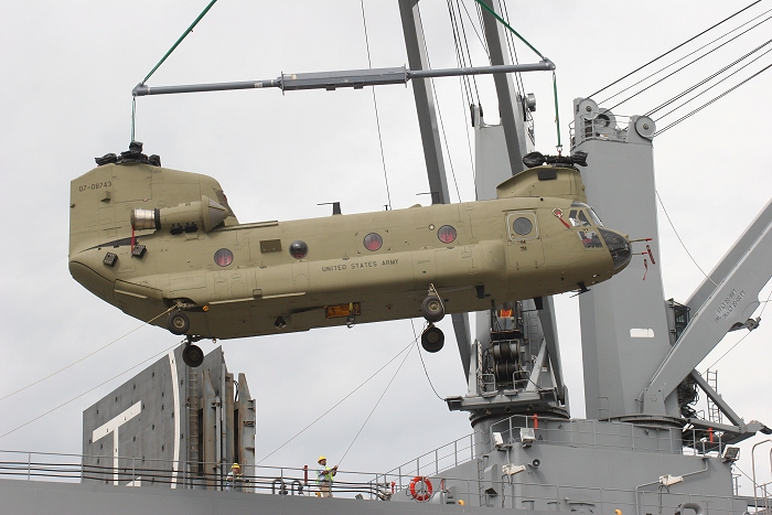 18 November 2010: CH-47F Chinook helicopter 07-08743 was the first to come off the ship via the center cargo hole.