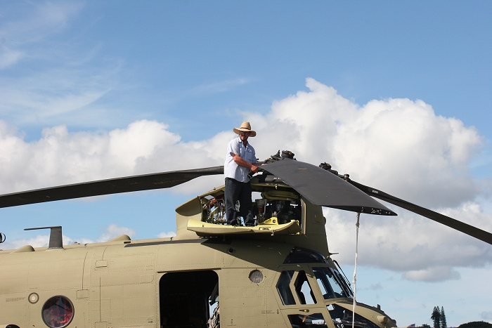 20 November 2010: Known as the guy who made the helicopter reassembly happen, Boeing Lead Mark Guida checks the work performed on CH-47F Chinook helicopter 09-08067 on the dock at Pearl Harbor.