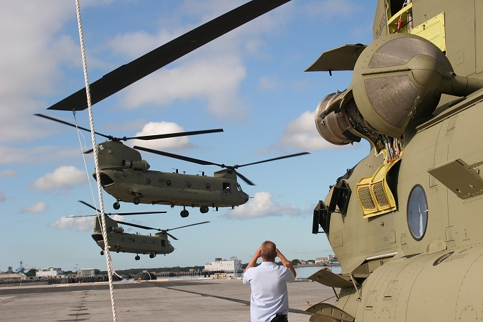 20 November 2010: CH-47F Chinook helicopter 07-08739 follows a sister ship as they depart the dock at Pearl Harbor enroute to Wheeler Army Airfield (PHHI), Hawaii.