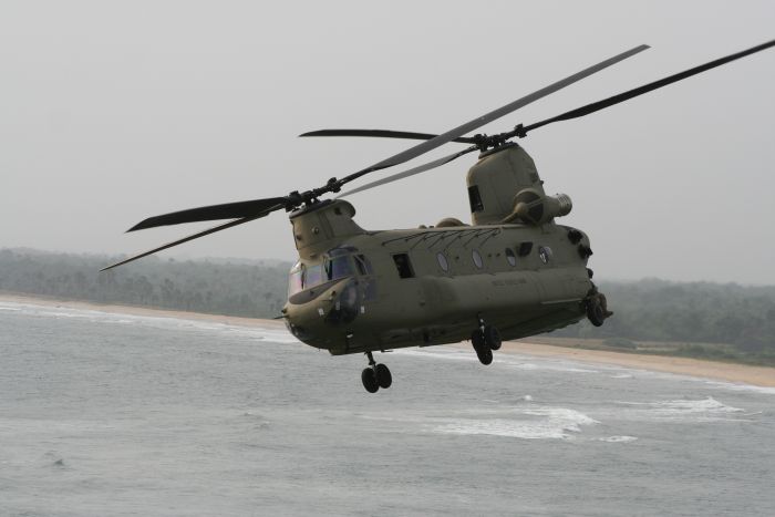 A CH-47F Chinook helicopter in flight over Liberia.