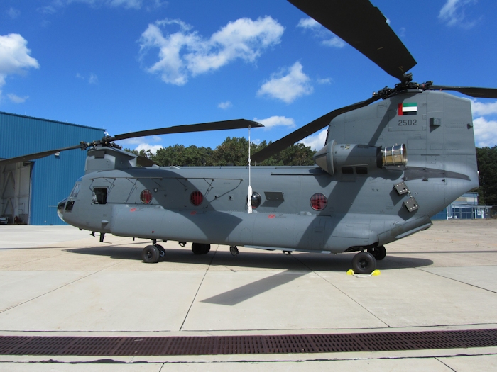 21 September 2012: Nearly ready for delivery, United Arab Emirates CH-47F Chinook helicopter tail number 2502 rests outside the hangar at Millville Municipal Airport (KMIV), New Jersey.