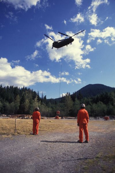 A CH-47D from the U.S. Army Reserve located in the State of Washington conducts a gravel lift on Mount Rainier in August 1991.