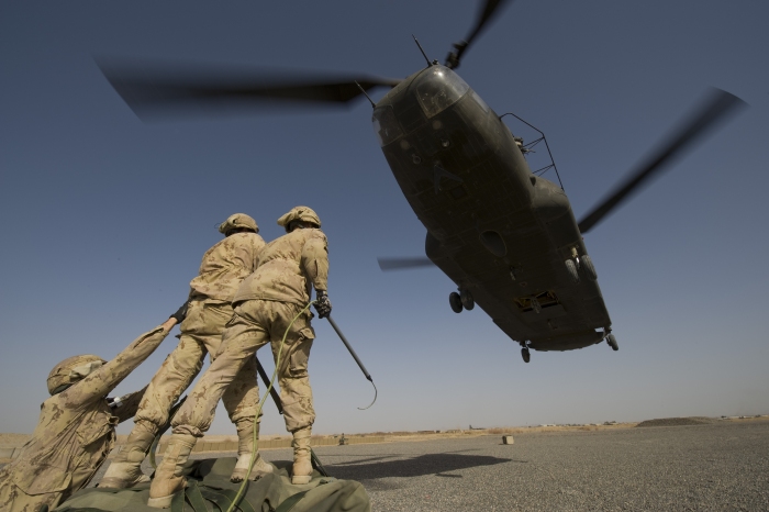 February 18, 2009 - Kandahar Airfield, Afghanistan: Aircraft riggers from the National Support Element wait to begin hoisting drills with a CH-147 Chinook helicopter from the Joint Task Force Afghanistan Air Wing.