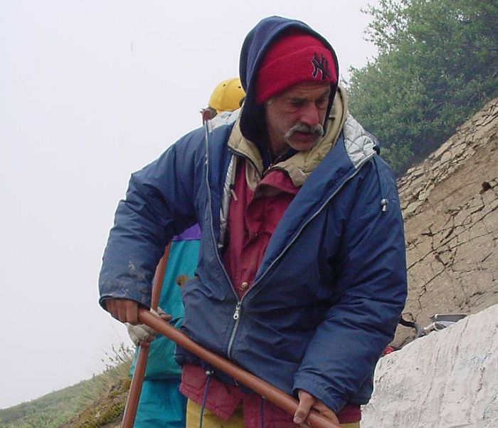 Gary Selinger clears excess debris away from Icky.